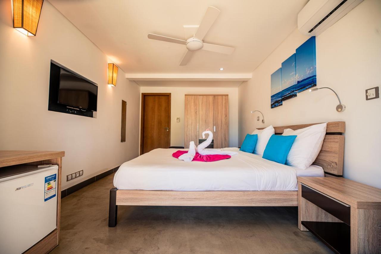 Toparadis Guest House Pereybere Beach Bagian luar foto