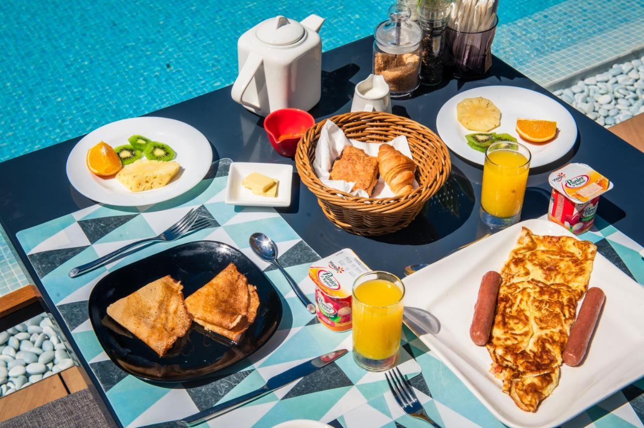 Toparadis Guest House Pereybere Beach Bagian luar foto